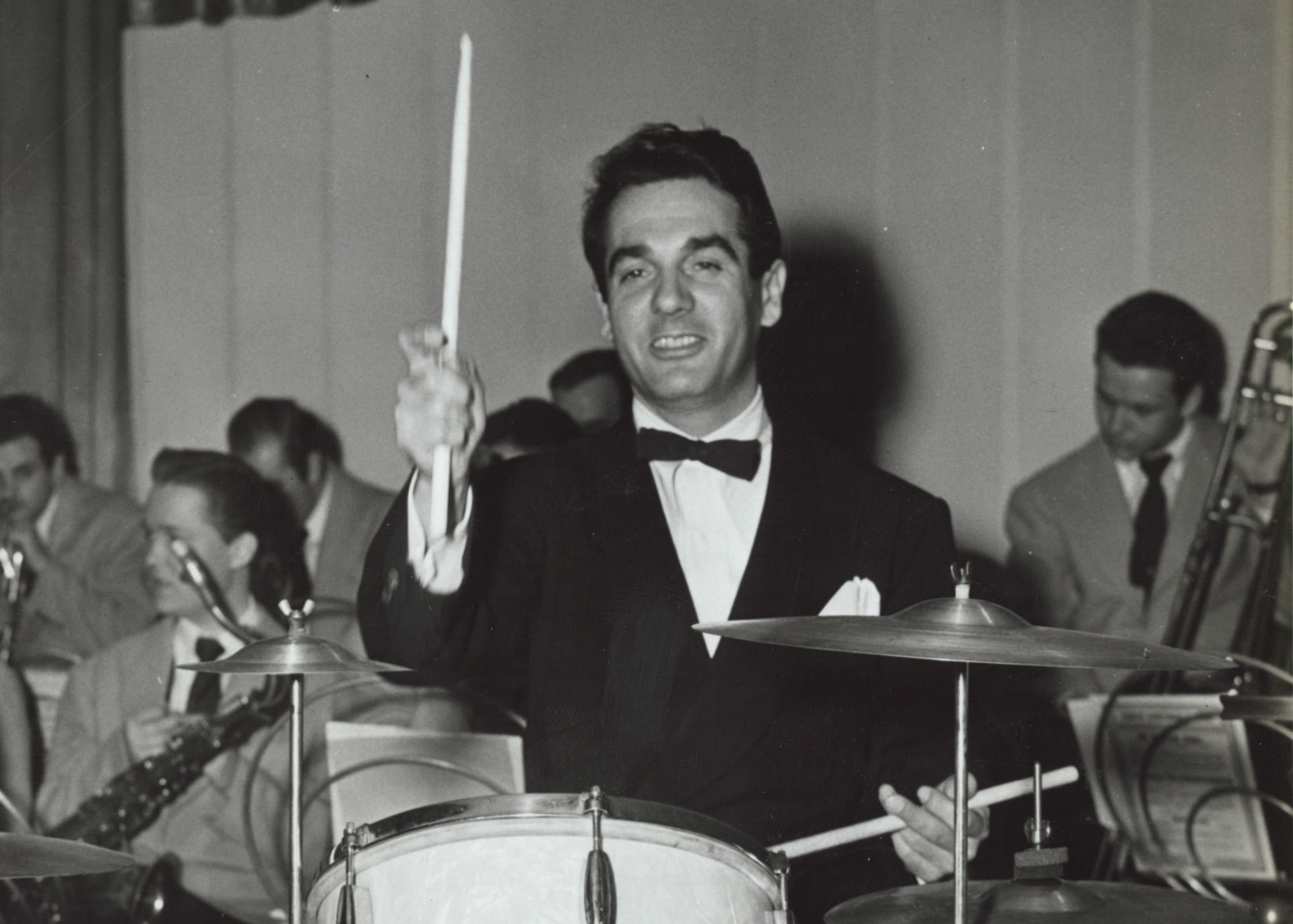Gene Krupa playing Slingerland drums with band